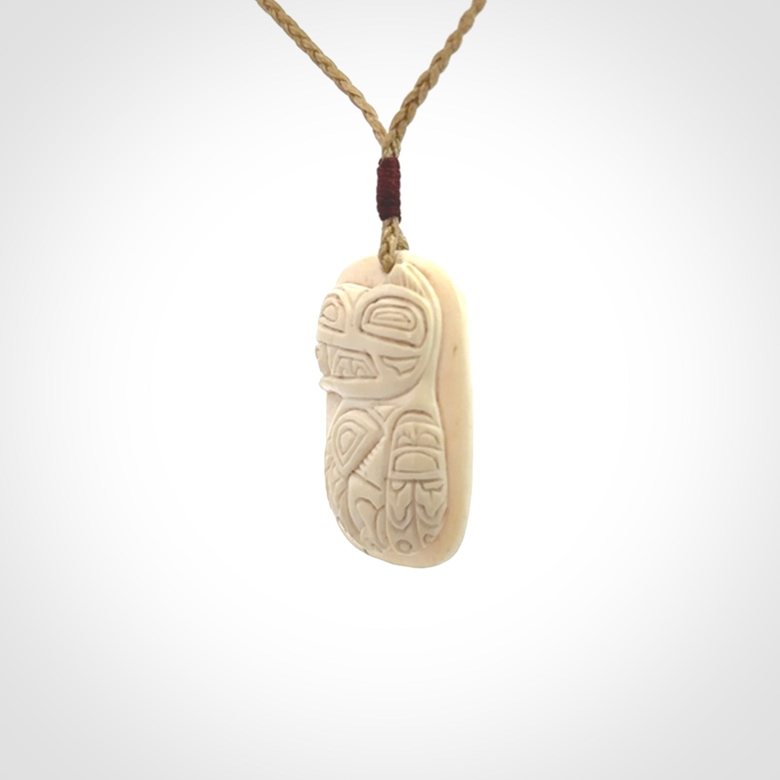 Hand carved woolly mammoth tusk pendant