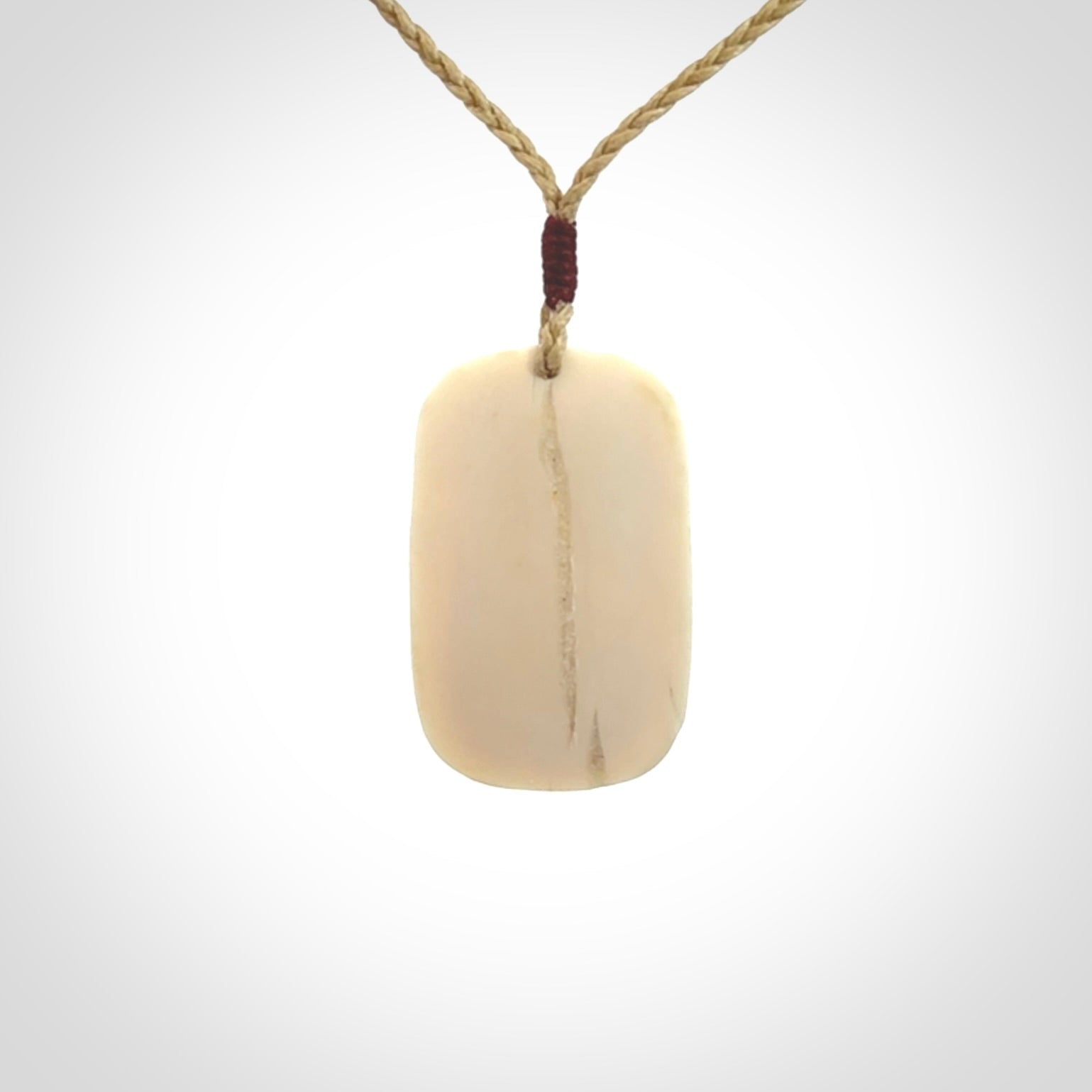 Hand carved woolly mammoth tusk pendant