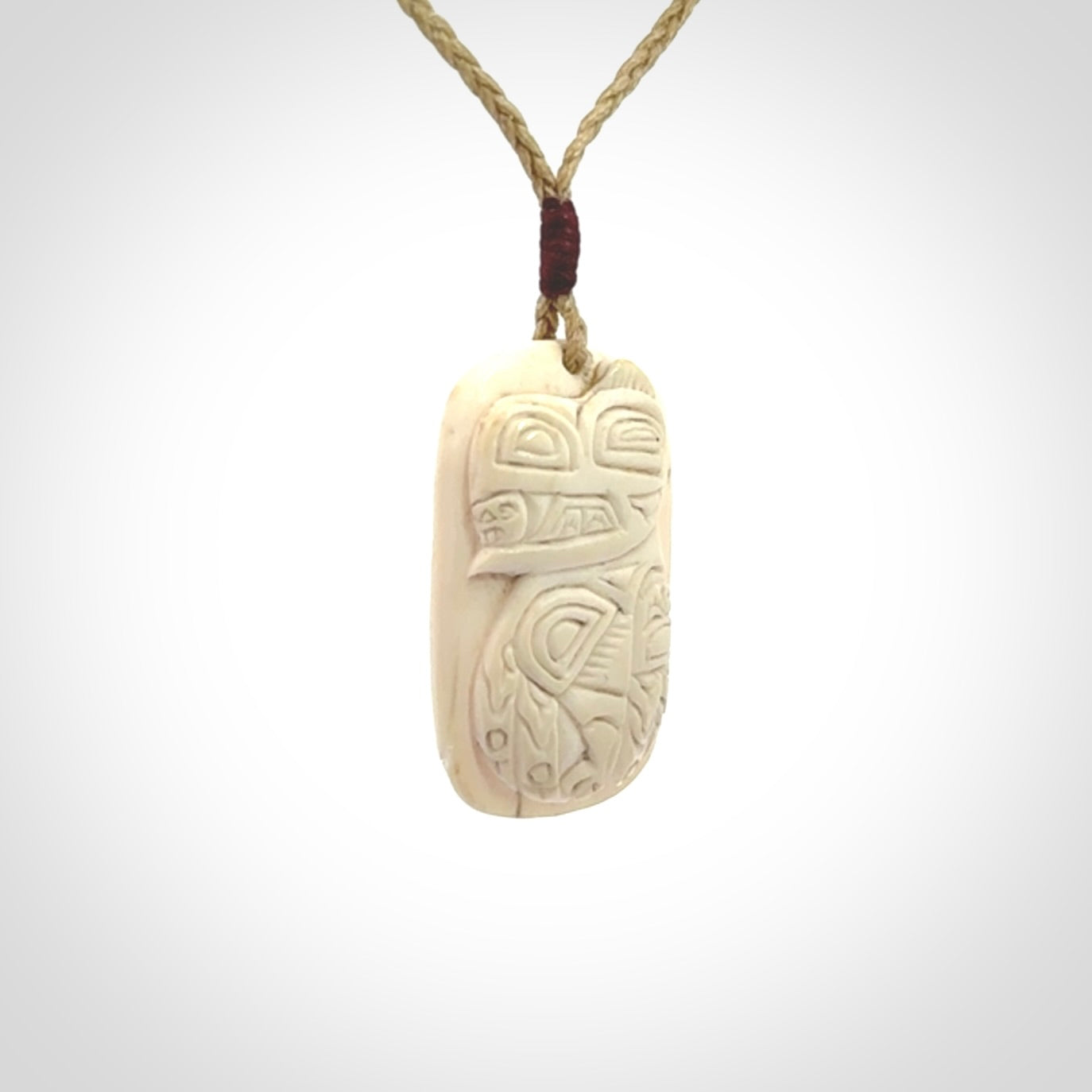 Hand carved woolly mammoth tusk pendant
