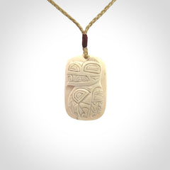 Hand carved woolly mammoth tusk pendant