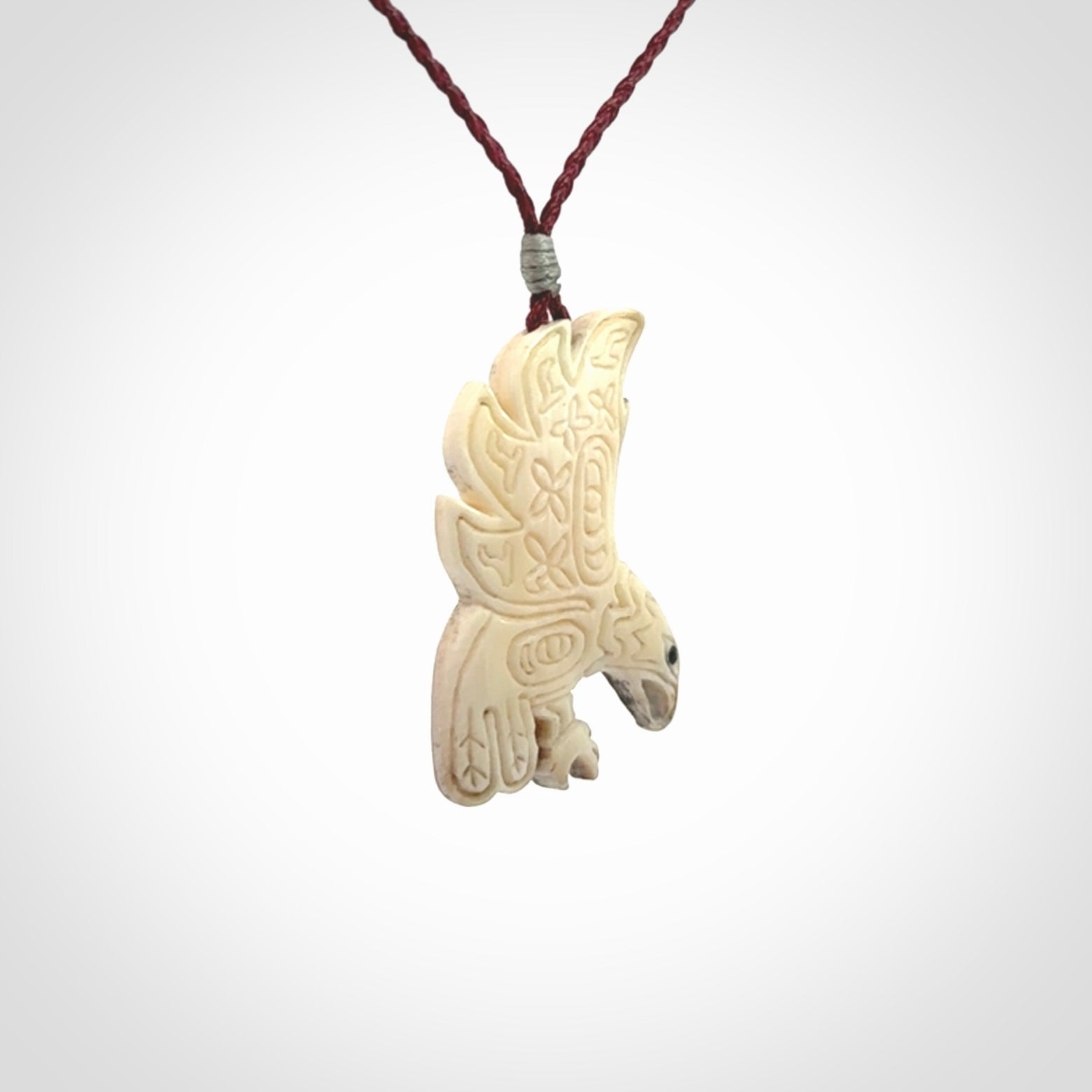 Hand Carved Woolly Mammoth Tusk bird pendant