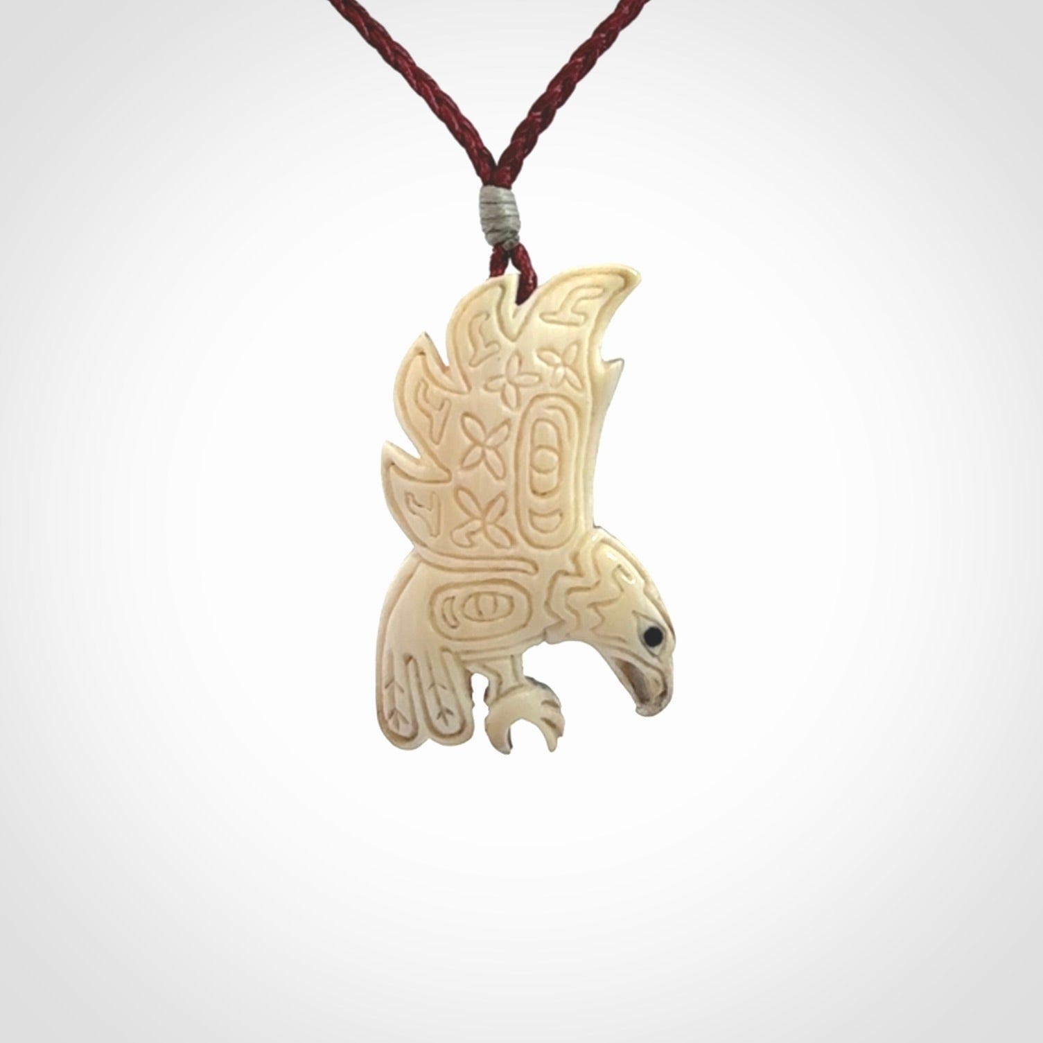 Hand Carved Woolly Mammoth Tusk bird pendant