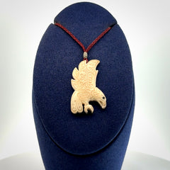 Hand Carved Woolly Mammoth Tusk bird pendant