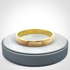 This piece is a hand made bracelet. It is made from selected pieces of woolly mammoth tusk which we have cut and polished and then inset into a brass bracelet. It is a very striking piece one of a kind and truly beautiful.