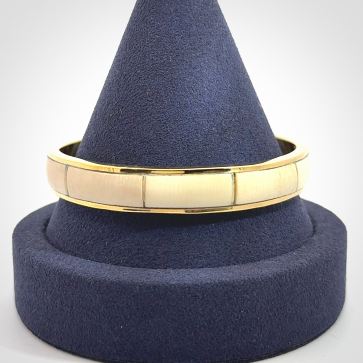 This piece is a hand made bracelet. It is made from selected pieces of woolly mammoth tusk which we have cut and polished and then inset into a brass bracelet. It is a very striking piece one of a kind and truly beautiful.