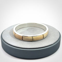 This piece is a hand made bracelet. It is made from selected pieces of woolly mammoth tusk which we have cut and polished and then inset into a sterling silver bracelet. It is a very striking piece one of a kind and truly beautiful.