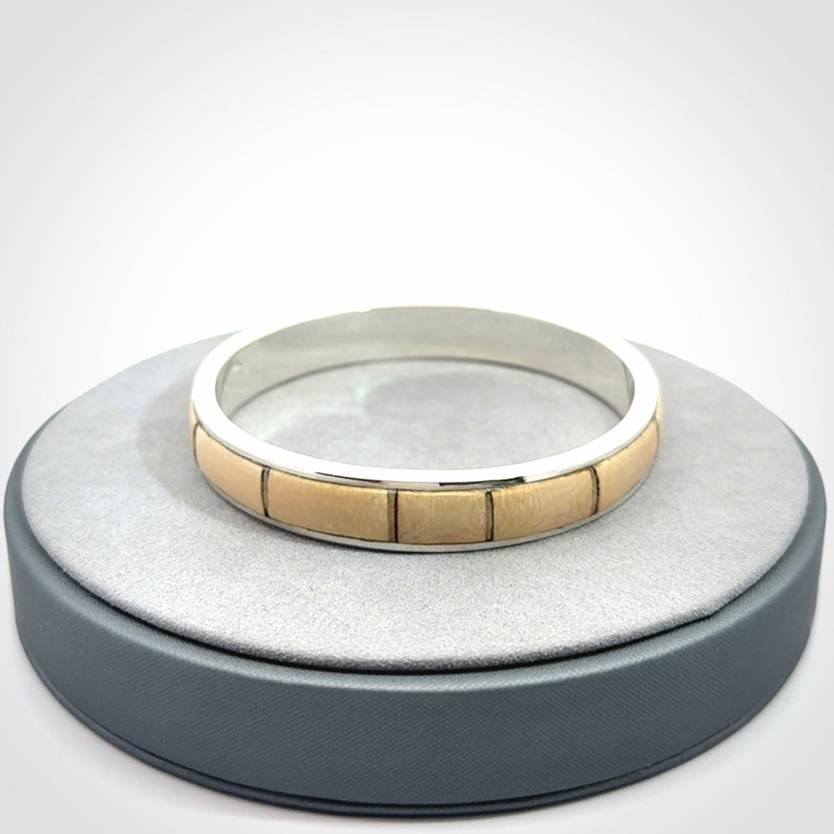 This piece is a hand made bracelet. It is made from selected pieces of woolly mammoth tusk which we have cut and polished and then inset into a sterling silver bracelet. It is a very striking piece one of a kind and truly beautiful.