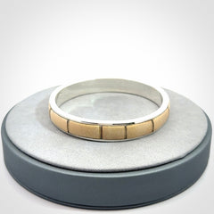 This piece is a hand made bracelet. It is made from selected pieces of woolly mammoth tusk which we have cut and polished and then inset into a sterling silver bracelet. It is a very striking piece one of a kind and truly beautiful.