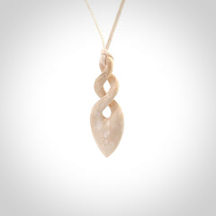 Hand carved woolly mammoth tusk twist pendant. Hand made jewellery made by NZ Pacific and for sale online.