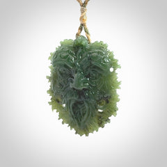 This picture shows a large hand carved forest man face pendant. The cord is hand plaited and adjustable.