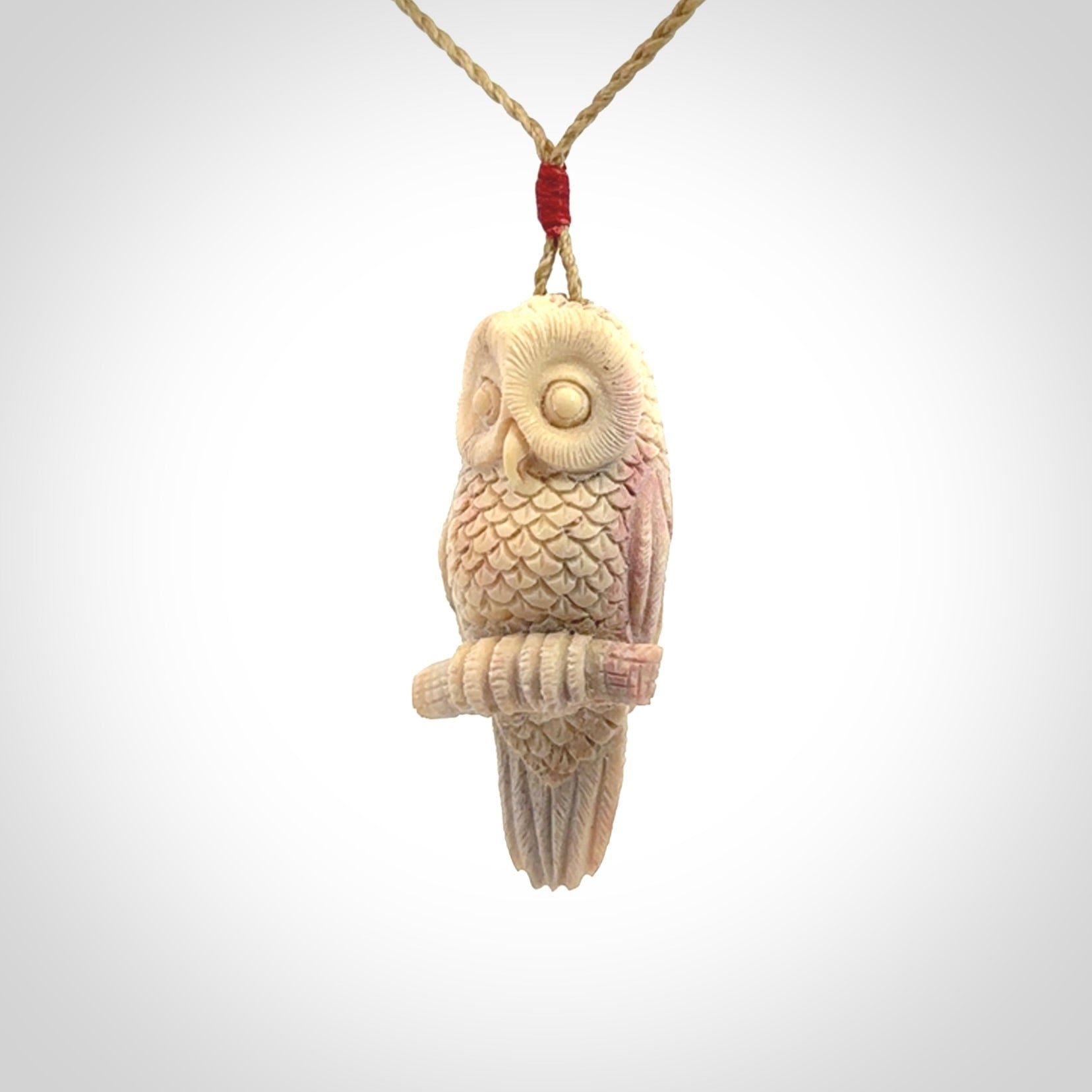 A traditional Owl design carving, hand made for us from deer antler, bone. This is a work of art and is a collectable piece of traditional bone carving. It can be worn as a special piece of jewellery or displayed. This is art made to wear at its finest.
