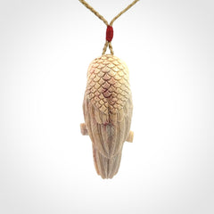 A traditional Owl design carving, hand made for us from deer antler, bone. This is a work of art and is a collectable piece of traditional bone carving. It can be worn as a special piece of jewellery or displayed. This is art made to wear at its finest.