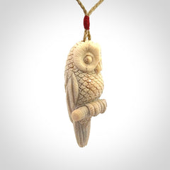 A traditional Owl design carving, hand made for us from deer antler, bone. This is a work of art and is a collectable piece of traditional bone carving. It can be worn as a special piece of jewellery or displayed. This is art made to wear at its finest.