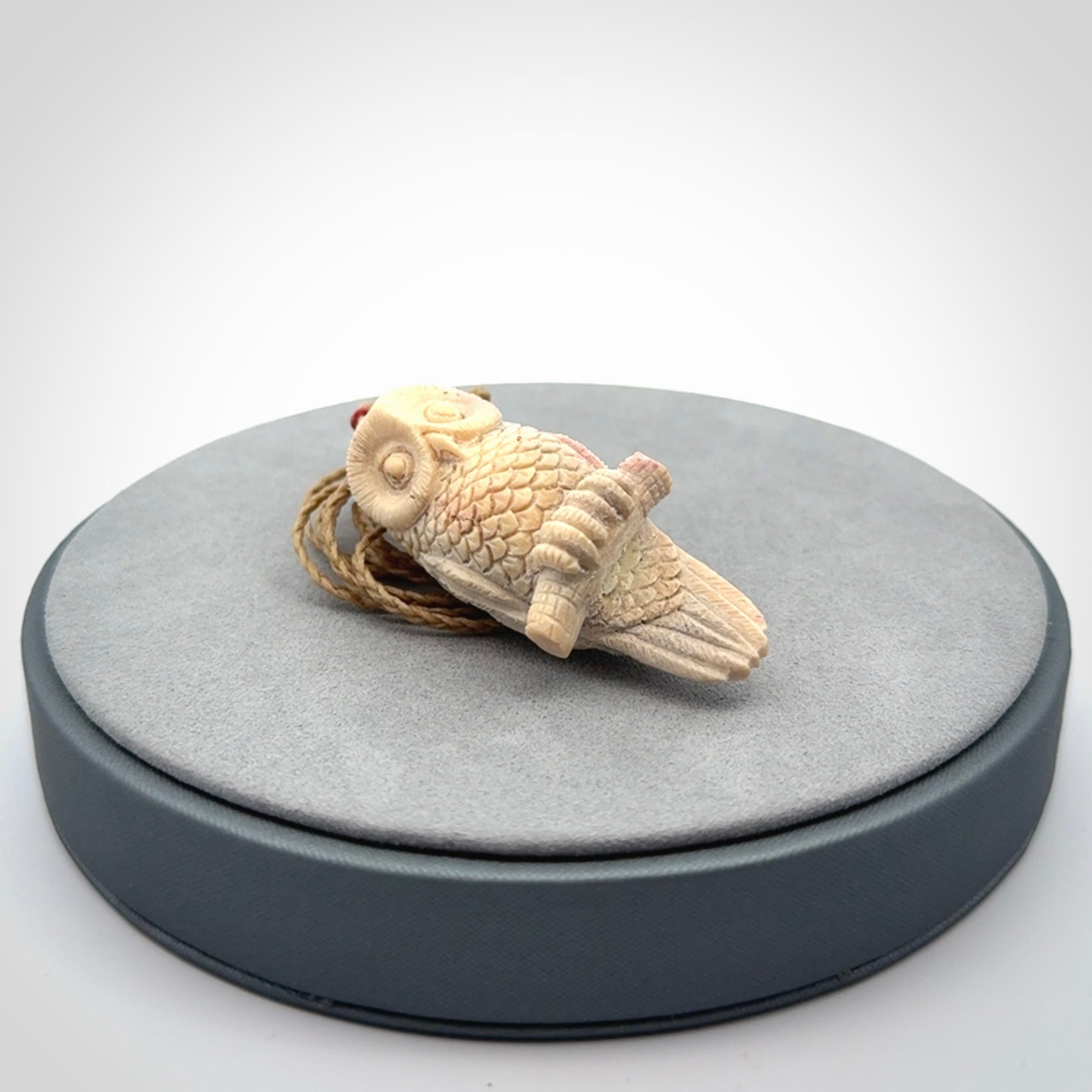 A traditional Owl design carving, hand made for us from deer antler, bone. This is a work of art and is a collectable piece of traditional bone carving. It can be worn as a special piece of jewellery or displayed. This is art made to wear at its finest.