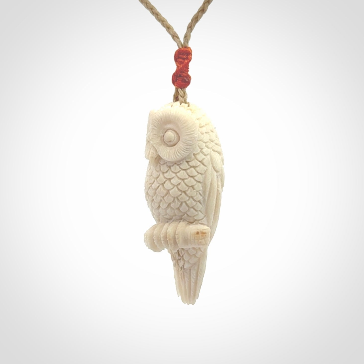 A traditional Owl design carving, hand made for us from deer antler, bone. This is a work of art and is a collectable piece of traditional bone carving. It can be worn as a special piece of jewellery or displayed. This is art made to wear at its finest.