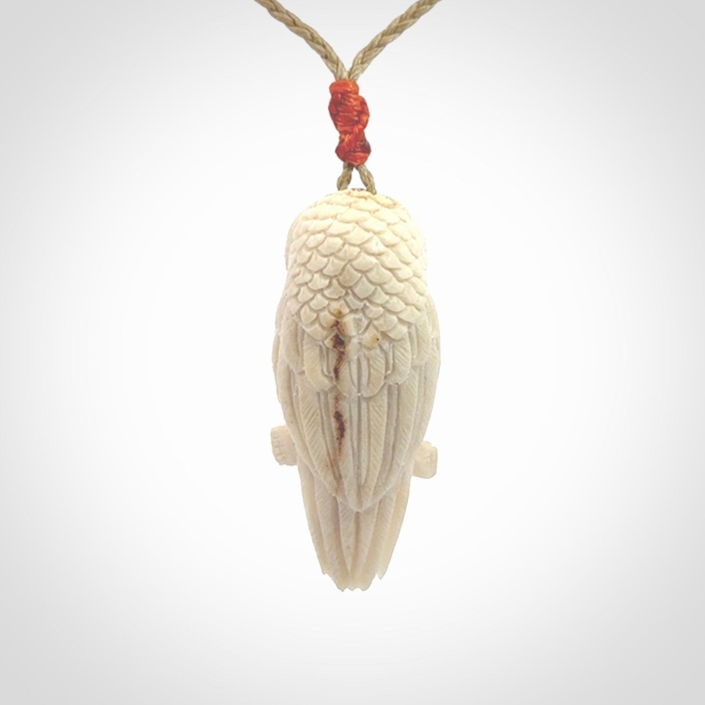 A traditional Owl design carving, hand made for us from deer antler, bone. This is a work of art and is a collectable piece of traditional bone carving. It can be worn as a special piece of jewellery or displayed. This is art made to wear at its finest.