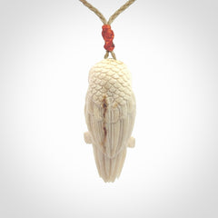 A traditional Owl design carving, hand made for us from deer antler, bone. This is a work of art and is a collectable piece of traditional bone carving. It can be worn as a special piece of jewellery or displayed. This is art made to wear at its finest.