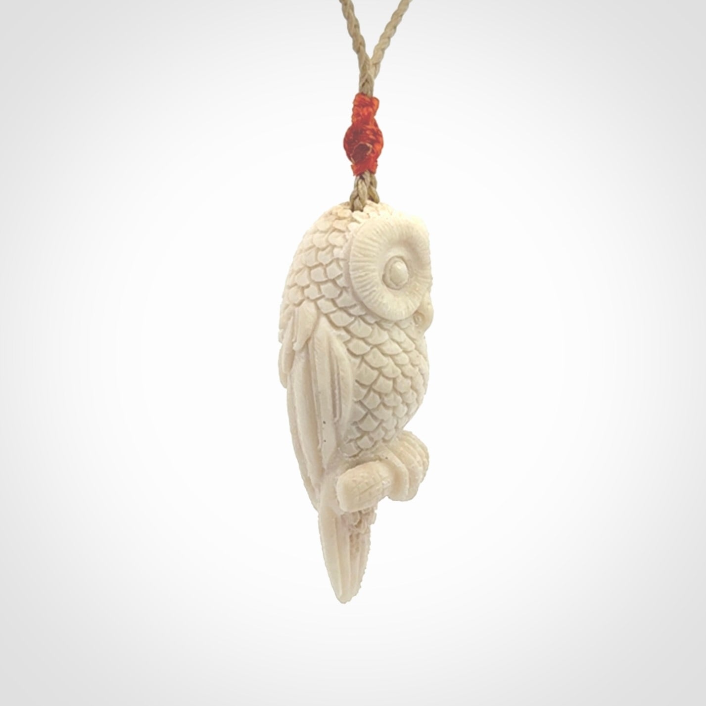 A traditional Owl design carving, hand made for us from deer antler, bone. This is a work of art and is a collectable piece of traditional bone carving. It can be worn as a special piece of jewellery or displayed. This is art made to wear at its finest.