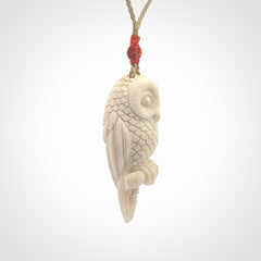 A traditional Owl design carving, hand made for us from deer antler, bone. This is a work of art and is a collectable piece of traditional bone carving. It can be worn as a special piece of jewellery or displayed. This is art made to wear at its finest.