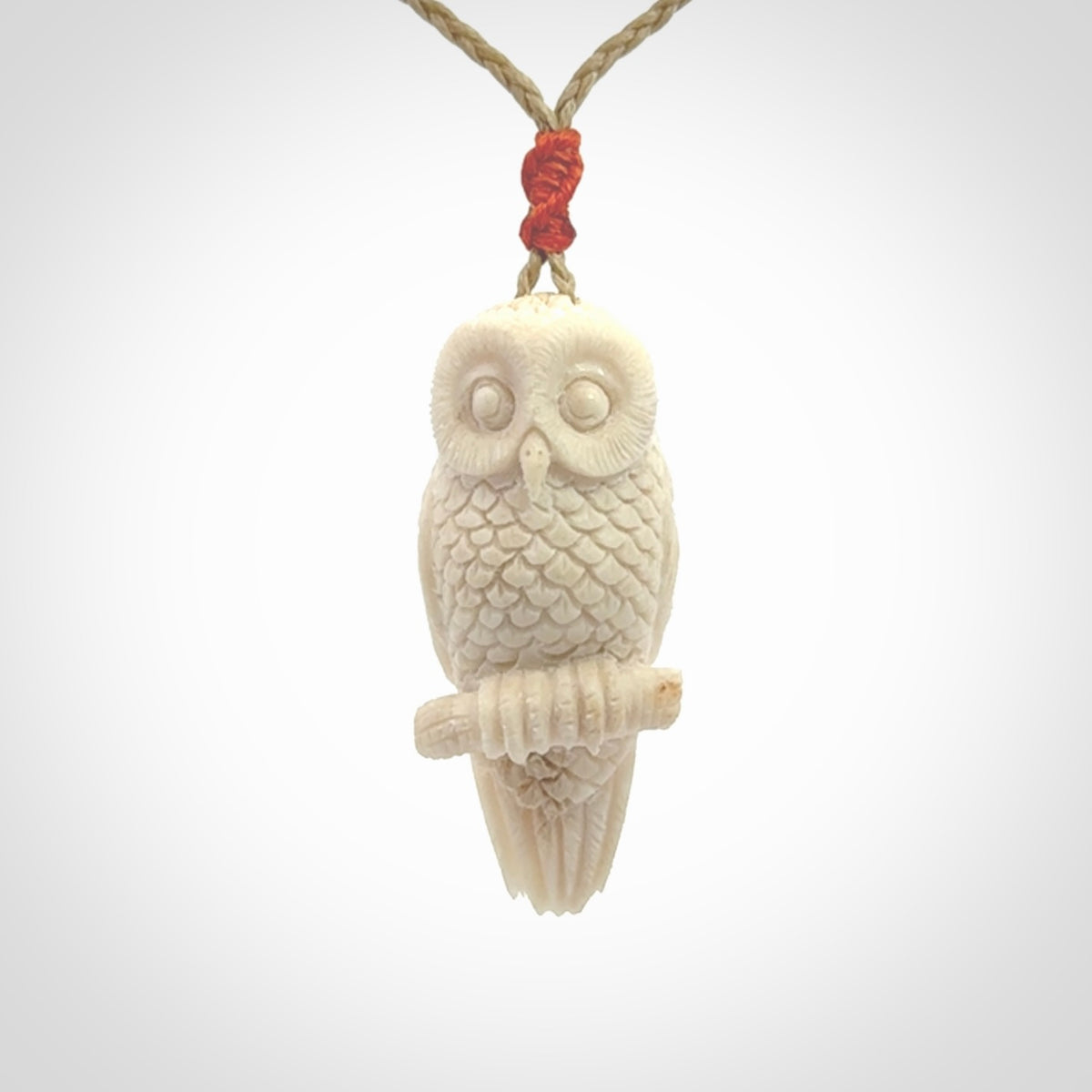 A traditional Owl design carving, hand made for us from deer antler, bone. This is a work of art and is a collectable piece of traditional bone carving. It can be worn as a special piece of jewellery or displayed. This is art made to wear at its finest.