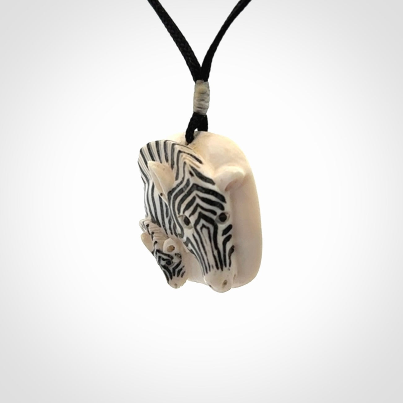 Hand carved Woolly Mammoth Tusk Zebra pendant