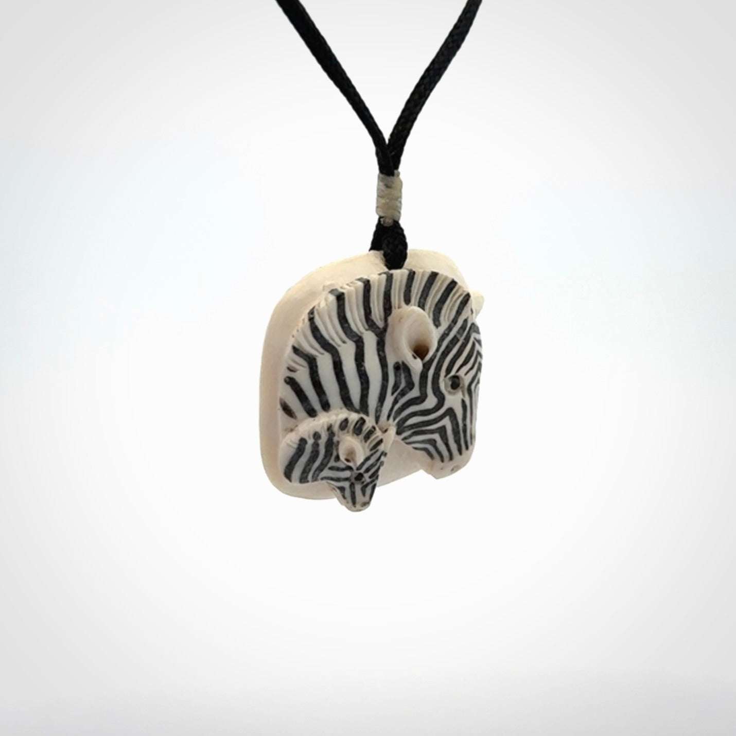 Hand carved Woolly Mammoth Tusk Zebra pendant