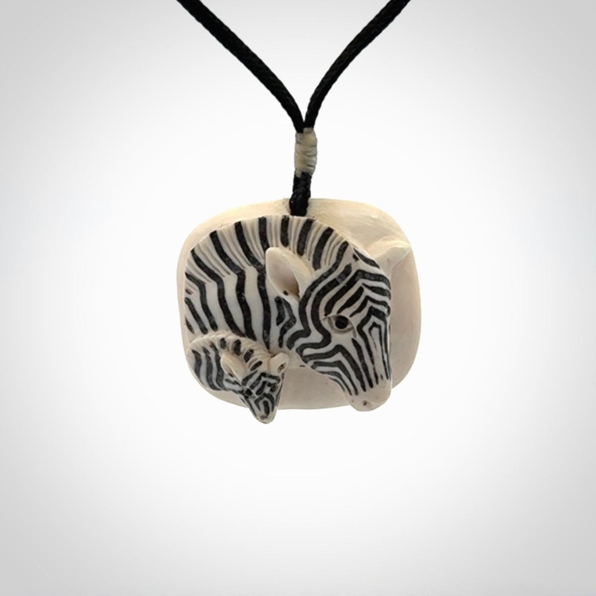 Hand carved Woolly Mammoth Tusk Zebra pendant
