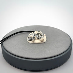 Hand carved Woolly Mammoth Tusk Zebra pendant