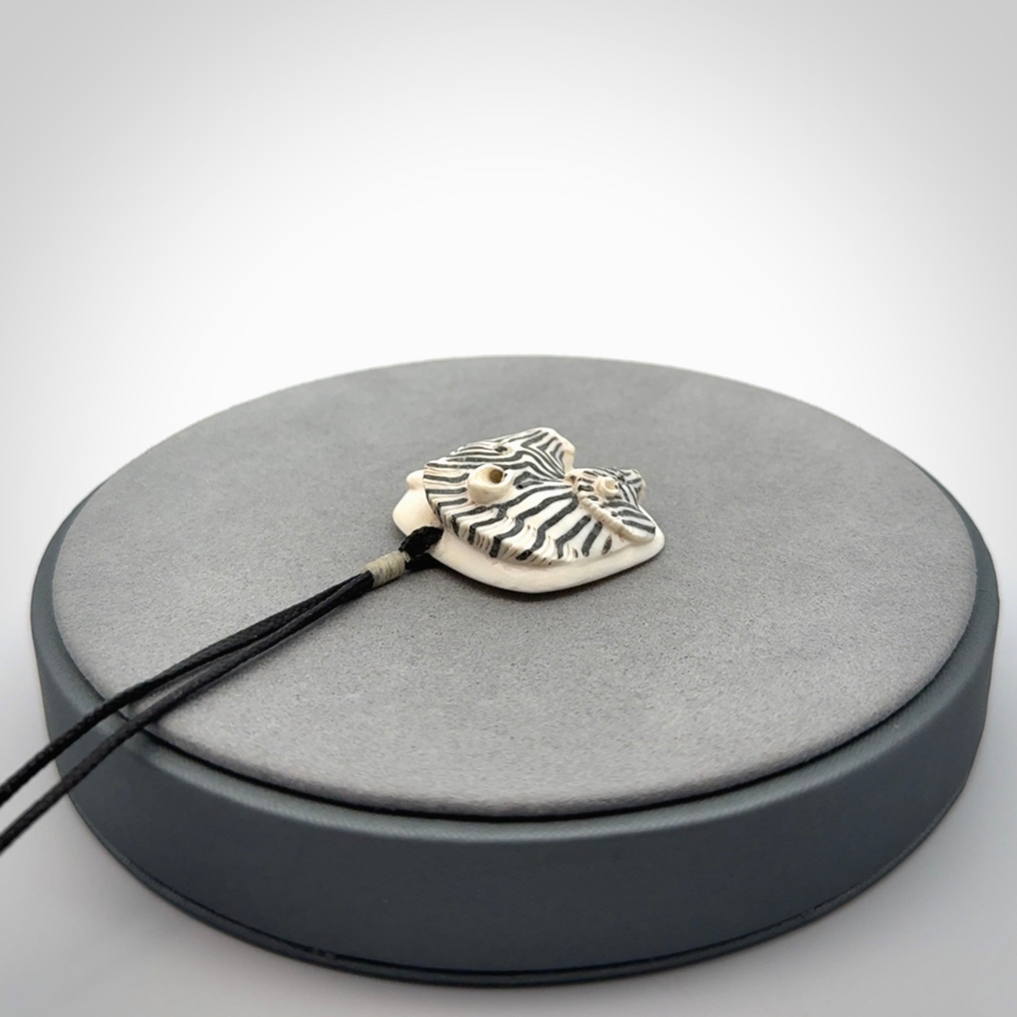 Hand carved Woolly Mammoth Tusk Zebra pendant