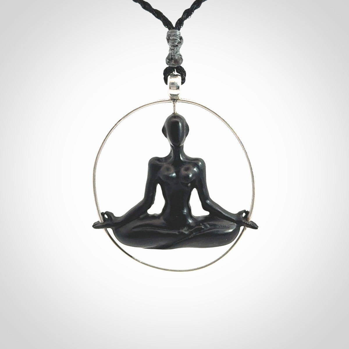 Australian Black Jade meditating female pendant with Sterling Silver. Unique art to wear from NZ Pacific.