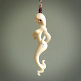 This pendant is a gorgeous and intricately carved mermaid and merman pendant. Carved by renowned bone carver Yuri Terenyi for us, this is a little masterpiece. The craftsmanship displayed in this piece is extraordinary - a collectors item, or a piece to wear and love.