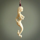 This pendant is a gorgeous and intricately carved mermaid and merman pendant. Carved by renowned bone carver Yuri Terenyi for us, this is a little masterpiece. The craftsmanship displayed in this piece is extraordinary - a collectors item, or a piece to wear and love.