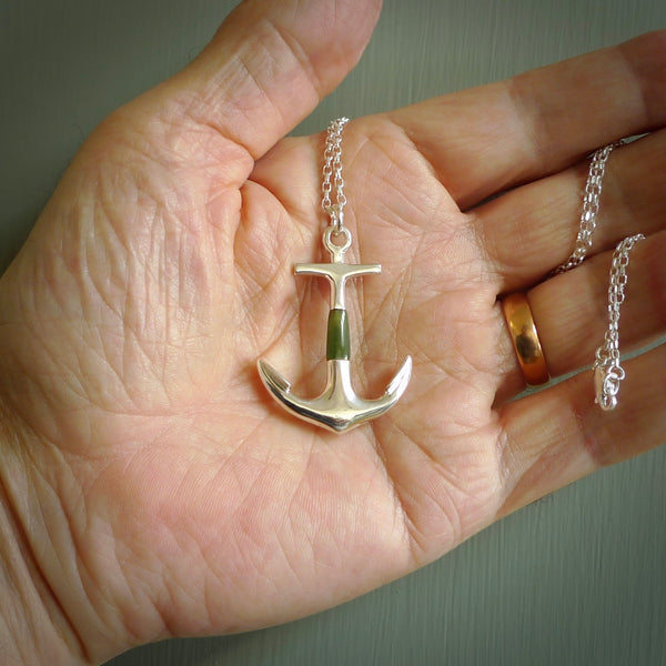 ANCHORED BY ME  A beautifully carved anchor for lovers of the ocean!  We have hand made this in New Zealand Jade paired with beautiful Sterling Silver.   A wonderful, mottled green stone with dark inclusions - the look of a well-used anchor.