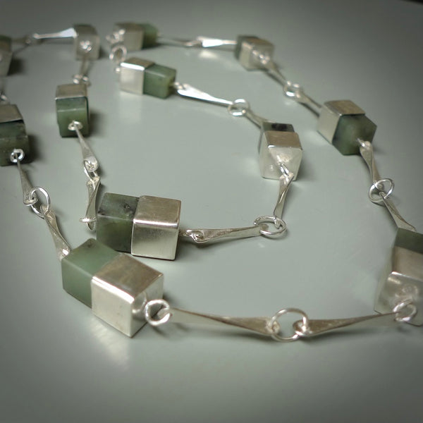 A photo of a sterling silver fashionable chain with New Zealand Jade. This is stylish woman's statement piece - hand crafted here in New Zealand. 