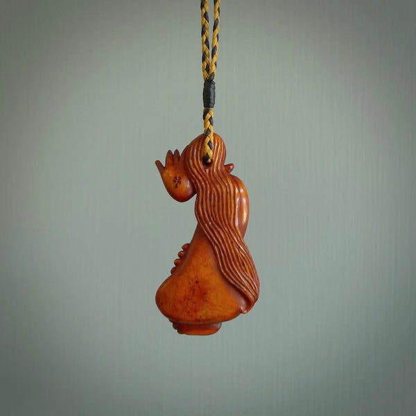 Hand carved stained bone female pendant. Made from natural bone. Bone jewellery from the Pacific for sale online. Female pendant for men and women.