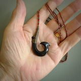 These pendants are hand carved, black jade Hawaiian hooks or Makau pendants. They are beautifully finished in a high polish and bound with a red khaki cord. Hand made jewellery that make the most wonderful gifts. Free shipping worldwide.