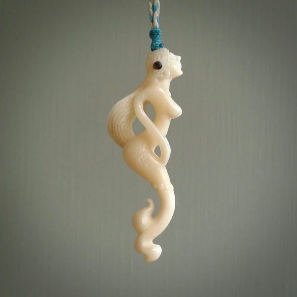 This pendant is a gorgeous and intricately carved mermaid and merman pendant. Carved by renowned bone carver Yuri Terenyi for us, this is a little masterpiece. The craftsmanship displayed in this piece is extraordinary - a collectors item, or a piece to wear and love.