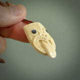 Hand carved Wheku pendant. Carved from woolly mammoth ivory by NZ Pacific. Hand crafted Mammoth tusk jewellery for sale online.