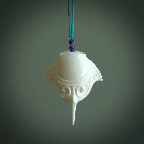 Hand carved bone manta ray pendant. Moana pendants carved by NZ Pacific. Hand made art to wear for sale online.