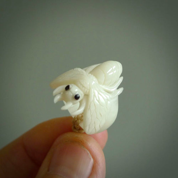 Hand carved natural bone wasp ring. Natural bone ring with wasp design. Hand made ring, delivered with international airmail. Postage is included. One only bone ring.