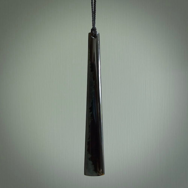 A hand carved large Black Jade drop, roimata, necklace. The cord is a black colour and is a fixed length. A large sized hand made drop necklace by New Zealand artist Kerry Thompson. One off work of art to wear.