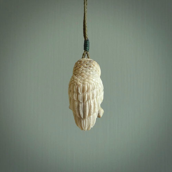 A traditional Owl design carving, hand made for us from deer antler, bone. This is a work of art and is a collectable piece of traditional bone carving. It can be worn as a special piece of jewellery or displayed. This is art made to wear at its finest.