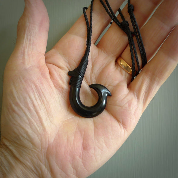 These pendants are hand carved, black jade Hawaiian hooks or Makau pendants. They are beautifully finished in a high polish and bound with a black cord and necklace. Hand made jewellery that make the most wonderful gifts. Free shipping worldwide.
