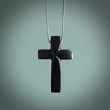 Hand carved black jade cross. Religious symbol pendant. Christian cross pendant for sale online.