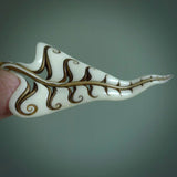 This is a large, hand carved leaf brooch. It is made from Bone and has a New Zealand Jade top. This is a large sized Lapel Pin and is a very unique, one only, brooch that is a collectors piece. Hand carved by New Zealand artist, Sami.