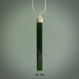 Hand carved New Zealand jade drop pendant with a sterling silver cap and chain.