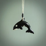 Hand carved black jade Orca pendant. Ocean themed pendants hand carved from natural materials by NZ Pacific. Unique handmade jewellery.