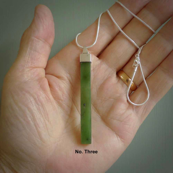 Hand carved New Zealand jade drop pendants with Sterling Silver. Contemporary drop necklaces that are hand made and will make fashionable statements around your neck. These beautiful Jade drops are with a sterling silver cap. For sale by NZ Pacific and shipped free worldwide.
