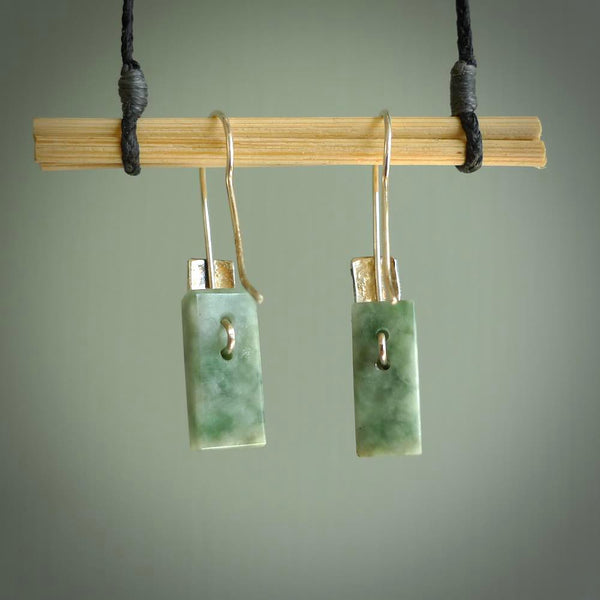 These modern rectangle jade drop earrings are beautifully hand made with gorgeous flair and chic design. They are fashionable and perfect for a women with style. Hand carved from a gorgeous piece of Siberian jade with sterling silver hooks - they are elegant and beautiful.
