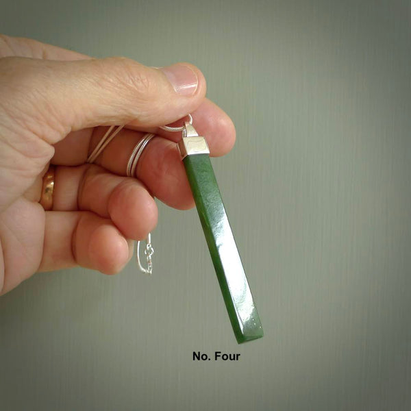 Hand carved New Zealand jade drop pendants with Sterling Silver. Contemporary drop necklaces that are hand made and will make fashionable statements around your neck. These beautiful Jade drops are with a sterling silver cap. For sale by NZ Pacific and shipped free worldwide.